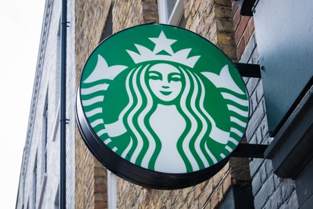 London, UK - July 22, 2024: Starbucks cafe in London. Starbucks Corporation is world's largest coffeehouse chain, trading in Nasdaq stock exchange.